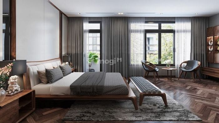Phòng ngủ tràn ngập ánh sáng tự nhiên nhờ vào các cửa sổ lớn, mang đến sự tươi mới và sức sống cho không gian.