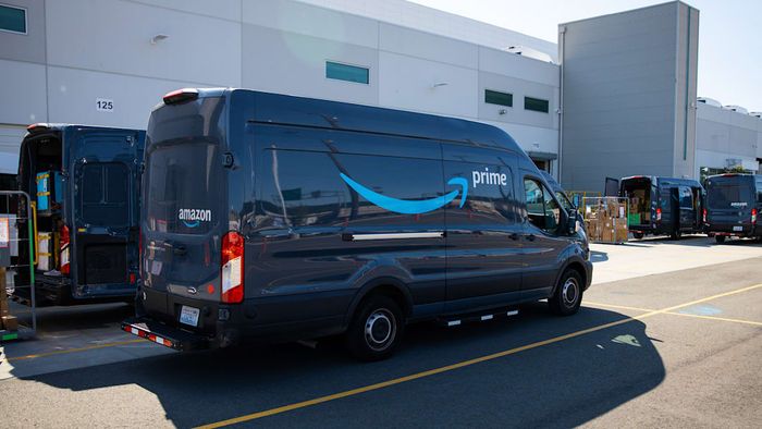 Amazon Prime delivery vans in a loading area