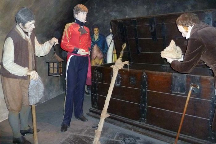 A depiction of Sir Walter Scott discovering the Honours of Scotland.