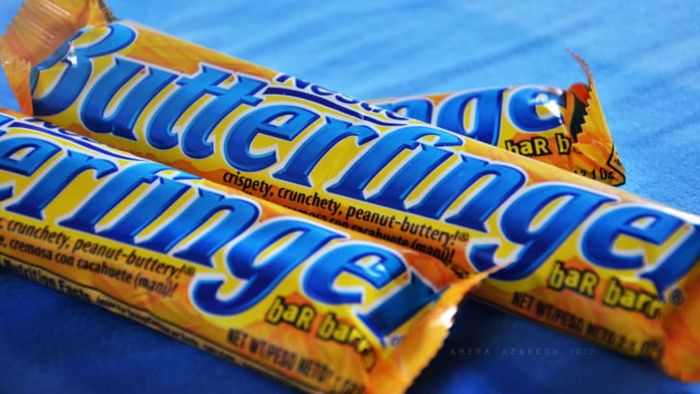 Three Butterfinger candy bars.