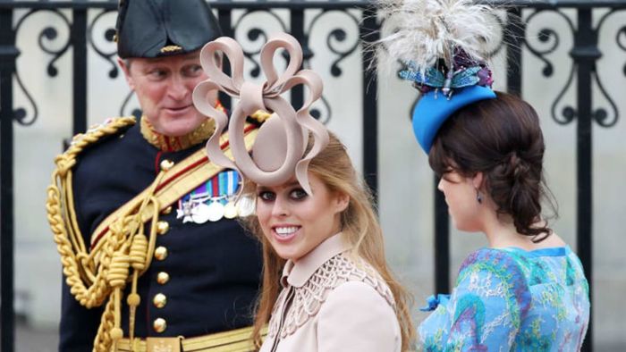 Princess Beatrice of York (L) with her sister Princess Eugenie of York arrive to attend the Royal Wedding of Prince William to Catherine Middleton at Westminster Abbey on April 29, 2011 in London, England