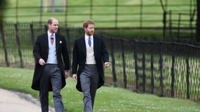 Britain's Prince Harry (R) and Britain's Prince William, Duke of Cambridge walk toward the church for the wedding of Pippa Middleton and James Matthews at St Mark's Church in Englefield, west of London, on May 20, 2017
