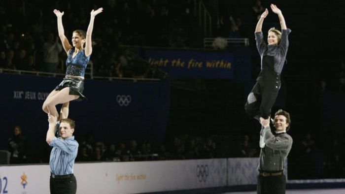Pairs skaters Jamie Salé and David Pelletier from Canada, along with Elena Berezhnaya and Anton Sikharulidze from Russia, perform during the figure skating exhibition at the Salt Lake City Winter Olympics.