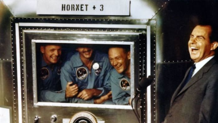 On July 24, 1969, Neil Armstrong, Michael Collins, and Buzz Aldrin enjoyed a lighthearted moment with President Richard Nixon aboard the USS Hornet.