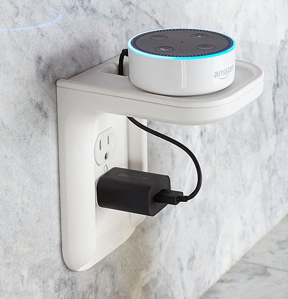The outlet shelf with an Echo Dot resting on top