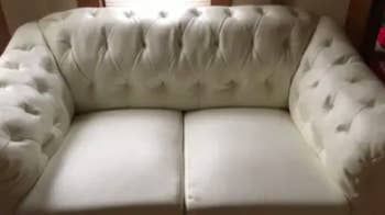 The same couch, now free of pen marks
