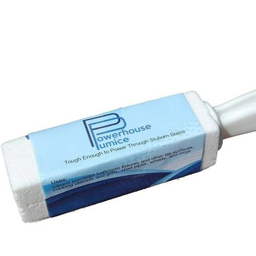 A rectangular cleaning stone complete with a handy handle.