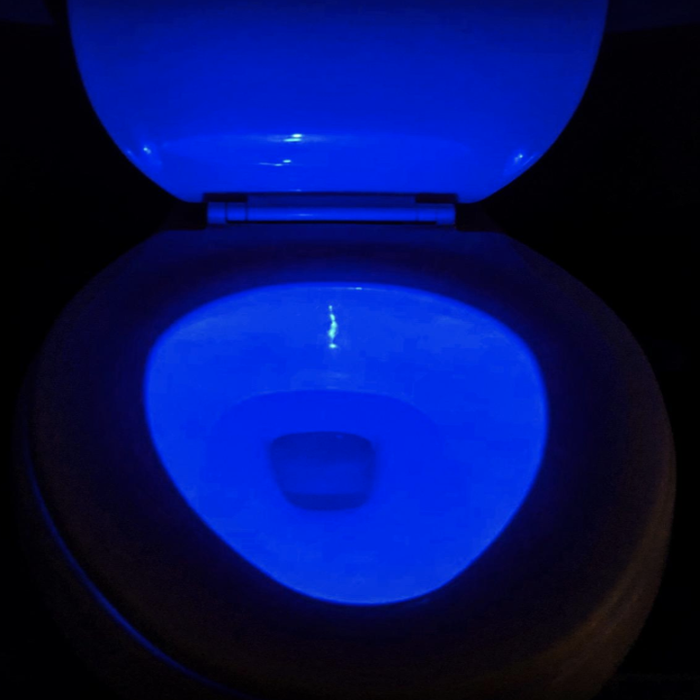 A reviewer's photo showing a toilet with a calming blue light