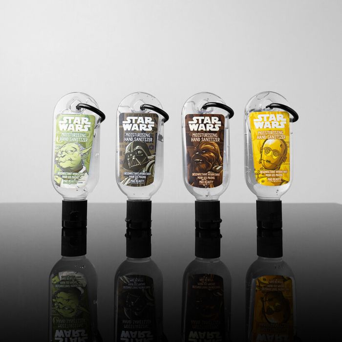 A series of mini hand sanitizers with attached keychain loops