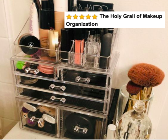A clear cosmetic organizer neatly arranged with makeup.