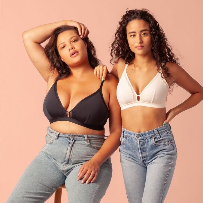 Models wearing the triangle bralette in black and nude