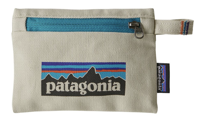 A small ivory-colored pouch with a contrasting blue zipper and the recognizable Patagonia logo.