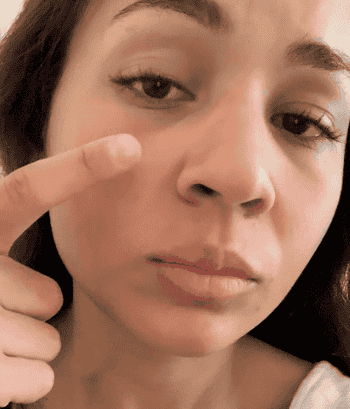 a gif of a Mytour employee applying Cloud Paint on their cheeks