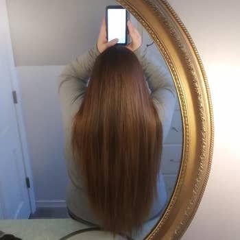 The same reviewer’s hair after using the 8 Second Wonder Water, looking noticeably shinier and healthier