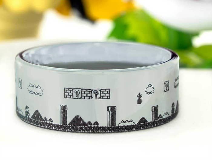 A silver ring designed to resemble a side-scrolling level from Super Mario Bros
