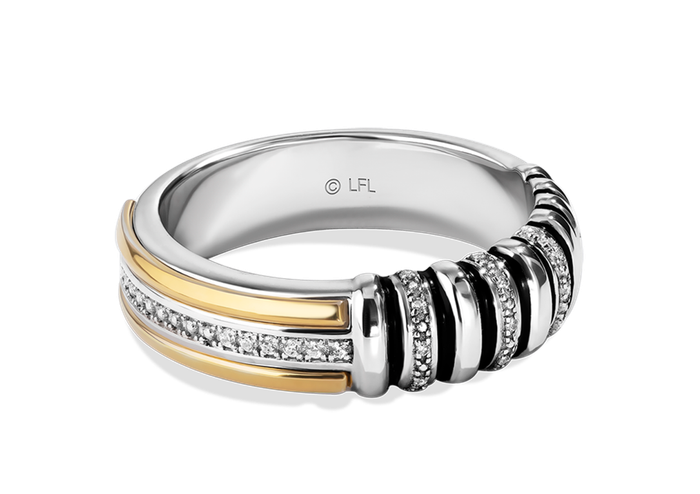A gold and silver ring adorned with shapes inspired by a lightsaber hilt and accented with white diamonds