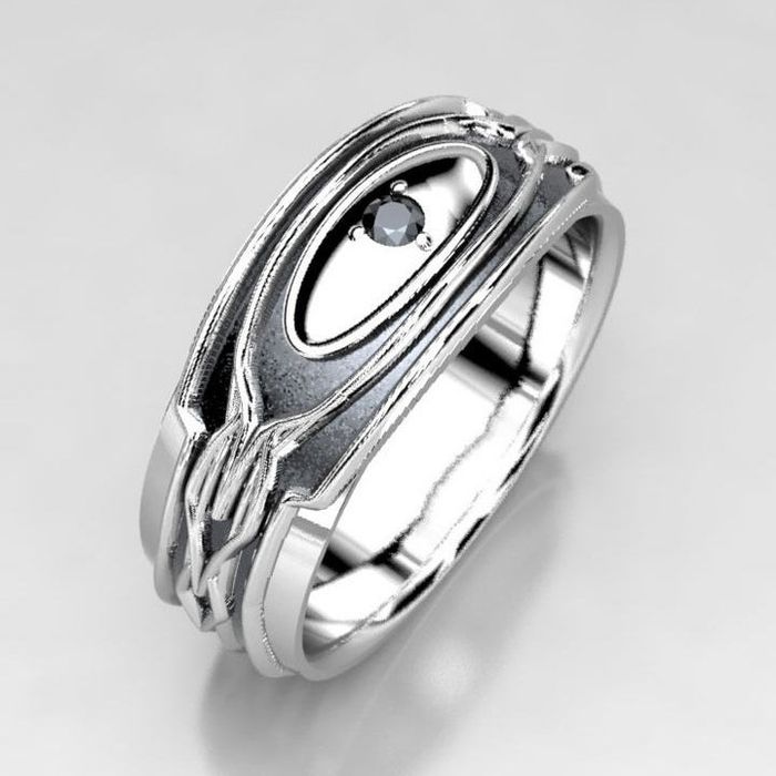 A sleek black and silver band featuring intricate geometric patterns and a petite black diamond at its center