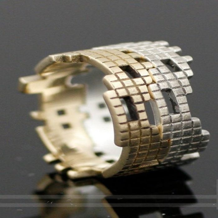 The same ring paired with a complementary silver version for a matching set