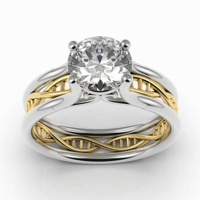 The same ring with a gold DNA-inspired segment integrated into the band