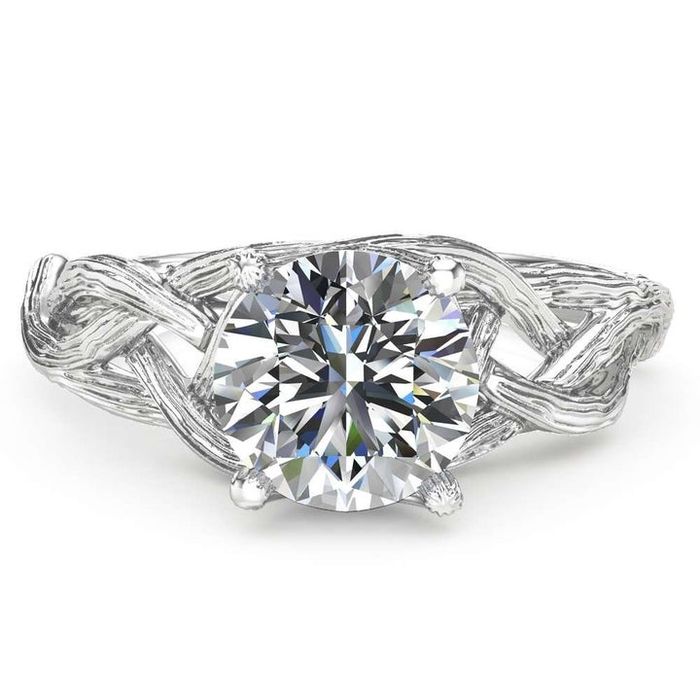 A top-down perspective of the same ring highlighting the radiant moissanite stone