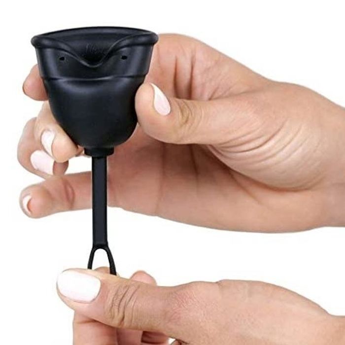 A pair of hands pulling the tab, demonstrating how it breaks the top seal of the Flex Cup.