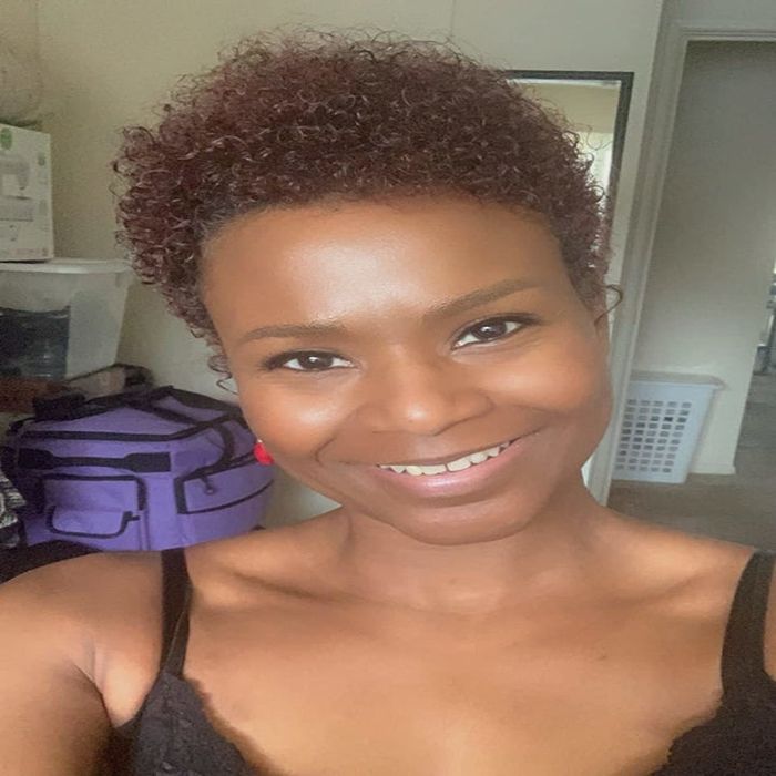 a reviewer with deeper skin tones glowing with a healthy, luminous finish