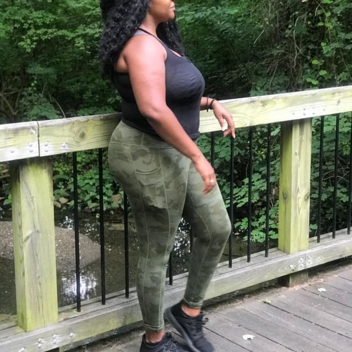 Reviewer donning camo leggings