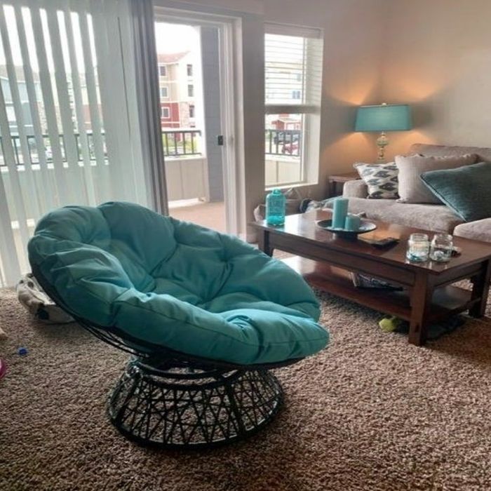 The blue chair in a reviewer’s living room setting