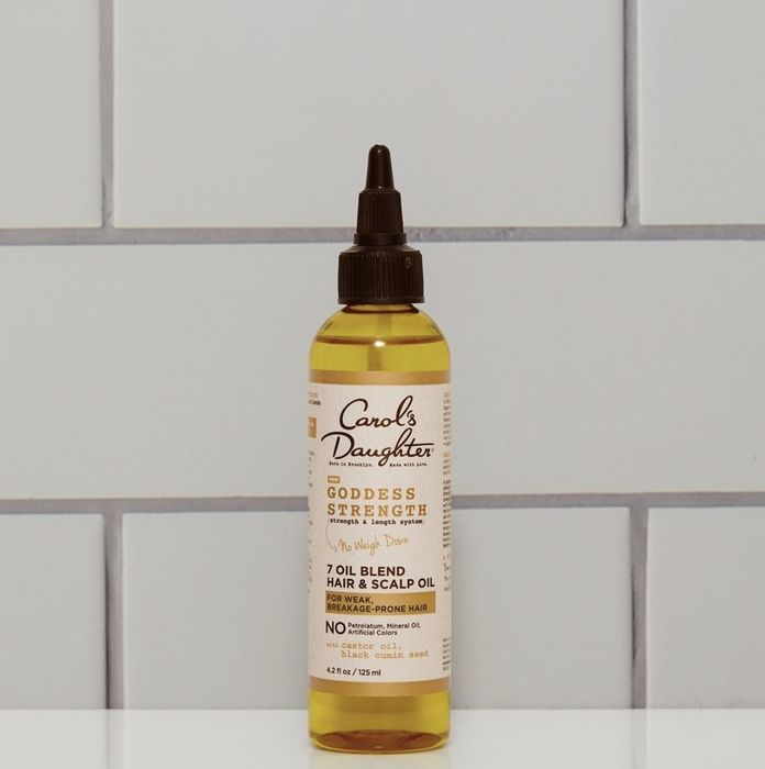 A bottle of nourishing hair and scalp oil