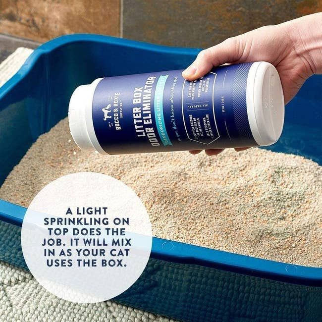 Hand sprinkling the deodorizer into the litter box