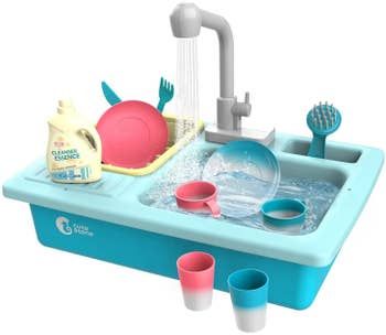 The blue sink complete with a functioning faucet, running water, and color-changing dish accessories