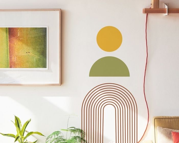 A vibrant yellow, green, and red decal beautifully displayed on a wall, adding a pop of color and style.