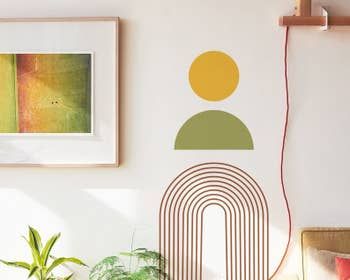 A vibrant yellow, green, and red decal beautifully displayed on a wall, adding a pop of color and style.