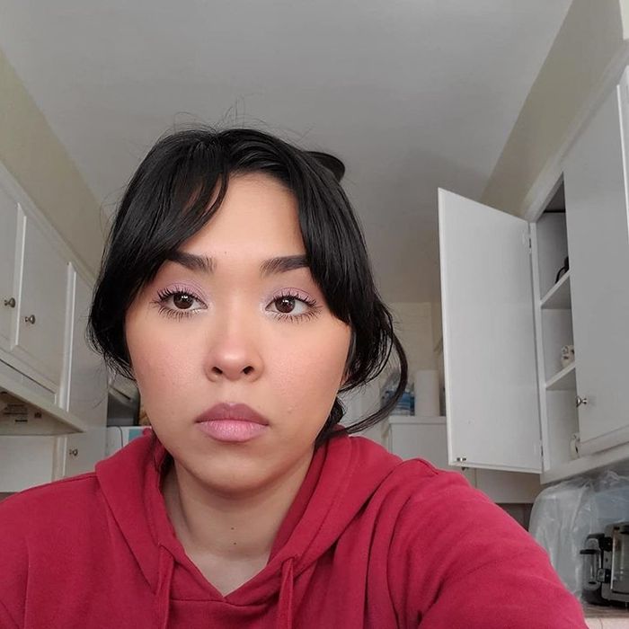 reviewer showcasing golden concealer