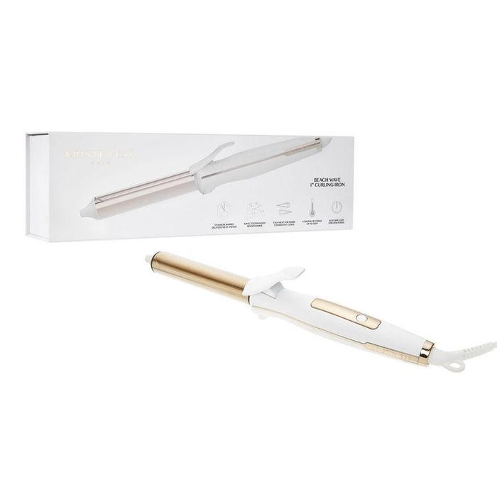 A white and gold curling iron along with its packaging