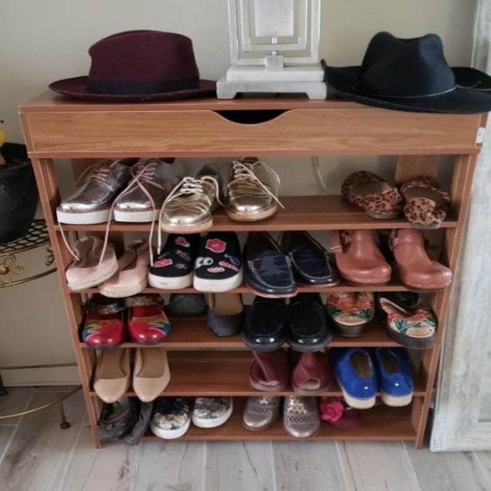 an image of a wooden shoe rack assembled by a reviewer