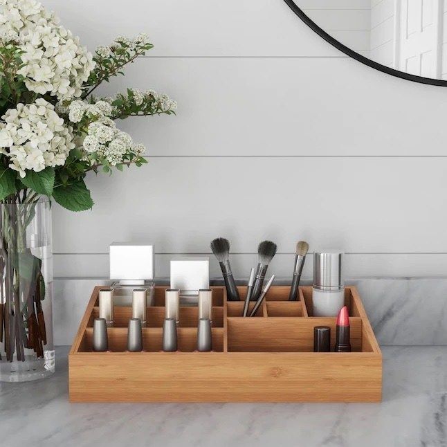 The organizer placed in a bathroom, filled with makeup items