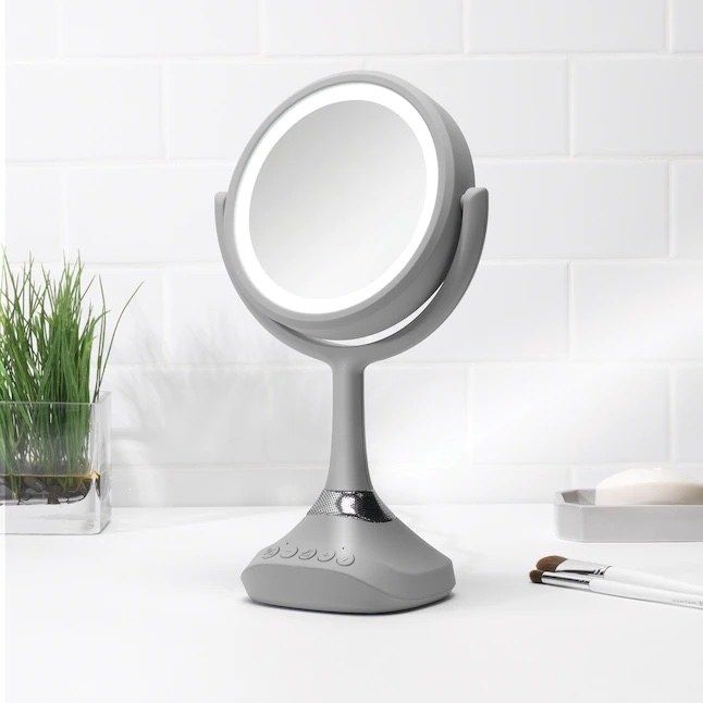 The makeup mirror placed on a countertop
