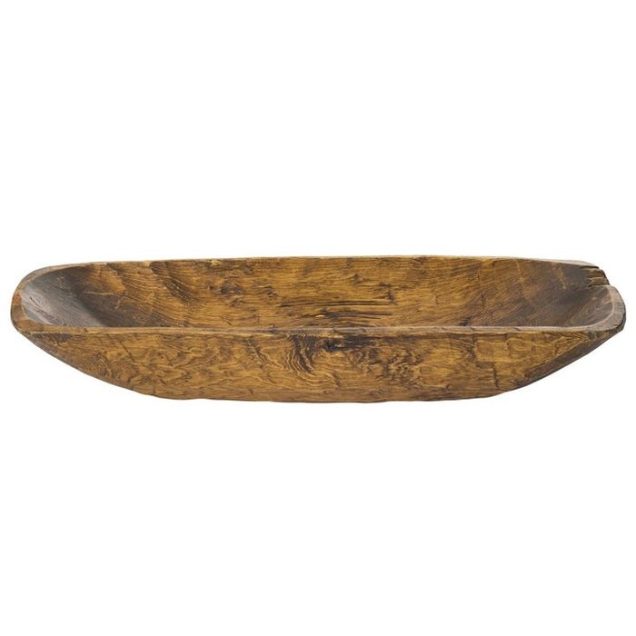 The wooden bowl, a versatile and stylish addition to any home