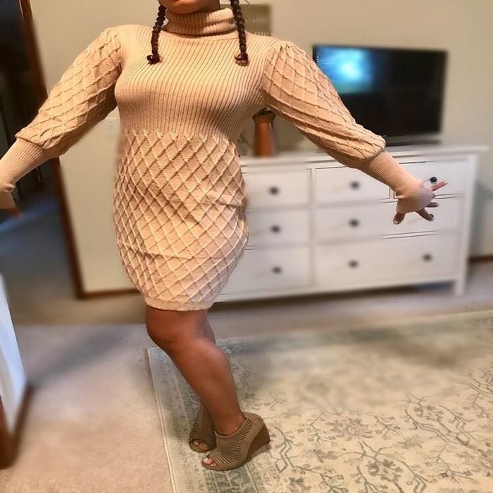 Reviewer wearing the turtleneck dress