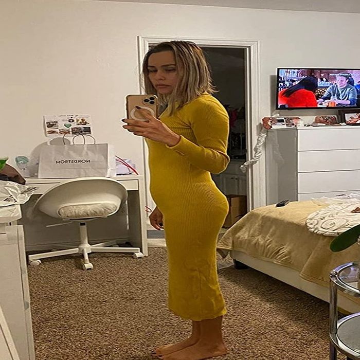 Reviewer wearing the yellow dress