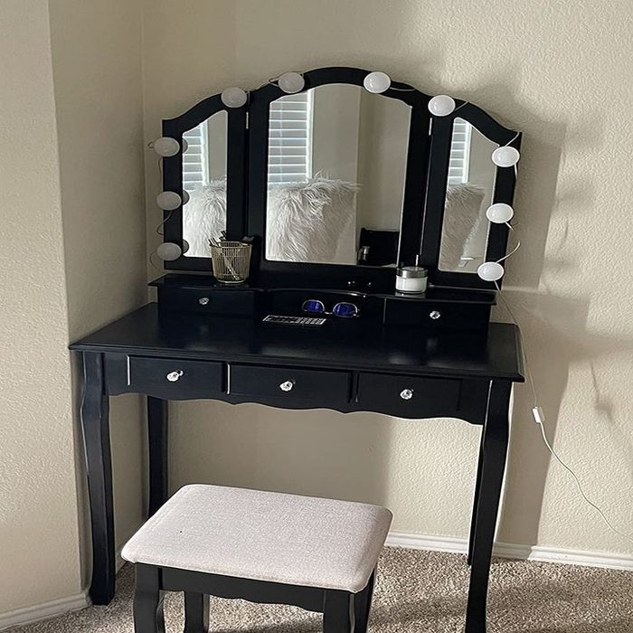 A reviewer's photo of the black vanity table set