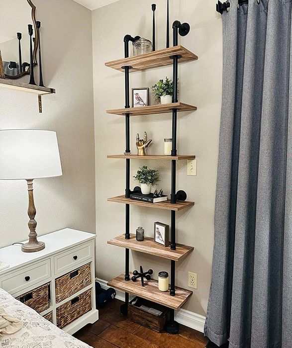A reviewer’s photo of the rugged industrial ladder shelf in use