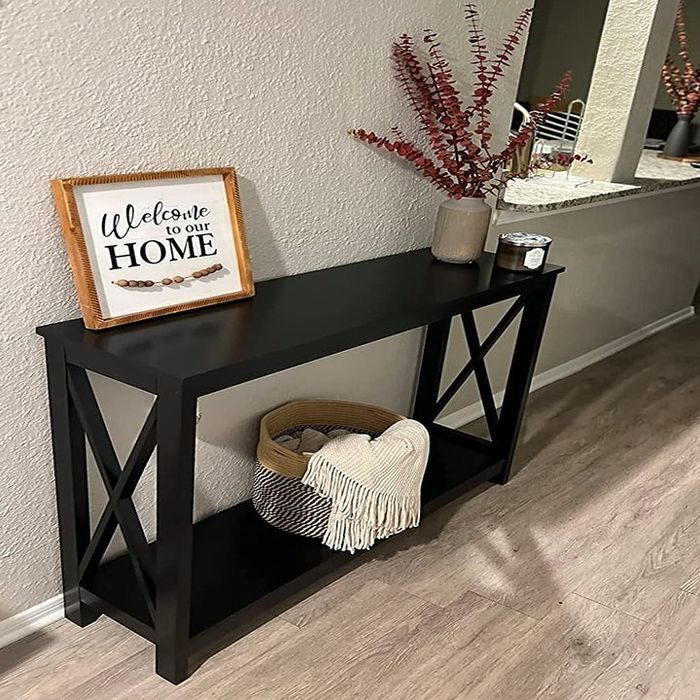 A reviewer’s photo showcasing the elegant black console table