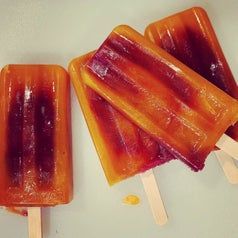 Reviewer's photo showcasing colorful ice pops made using the mold