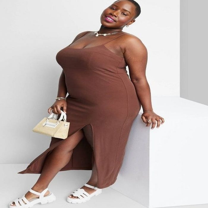 Model showcasing the dark brown dress