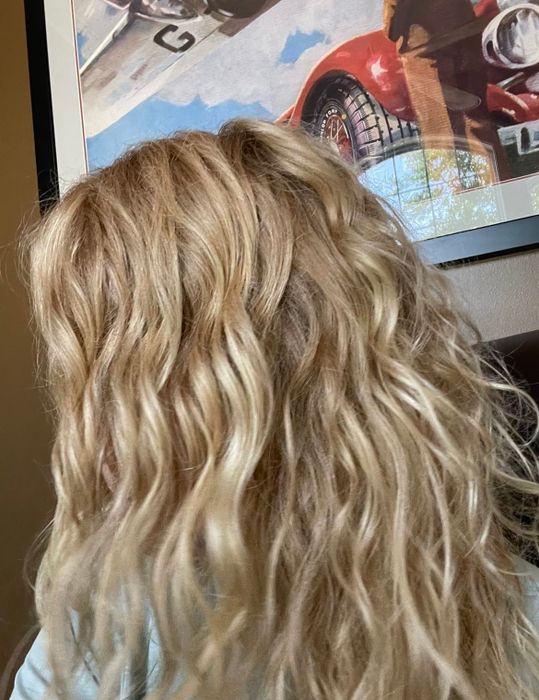 A reviewer’s hair air-dried with the product