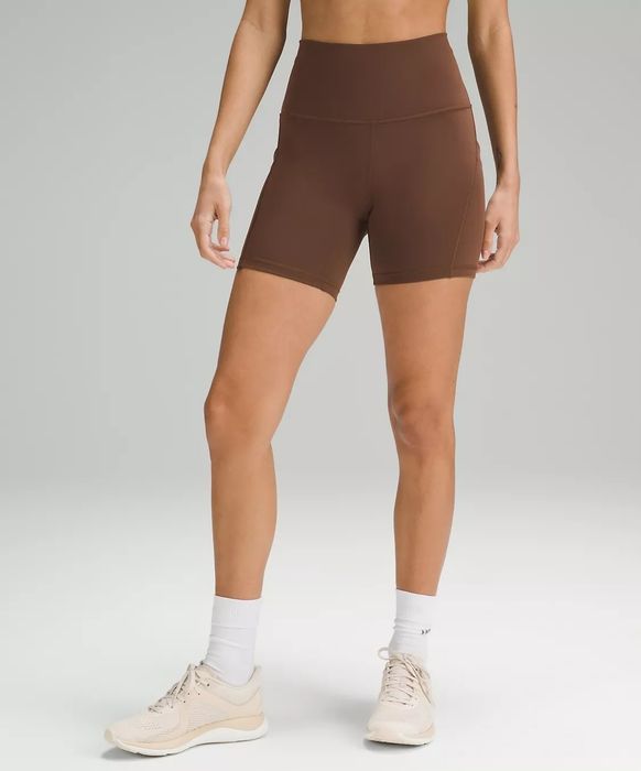 brown biker shorts on model