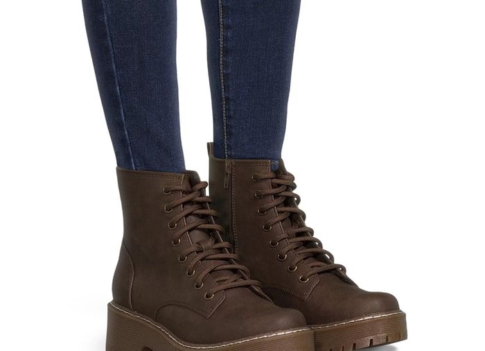 The brown boots feature a lace-up design and convenient side zippers