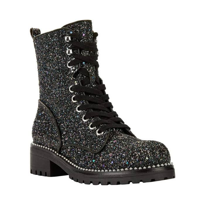 The boot featuring multi-colored glitter and beaded accents